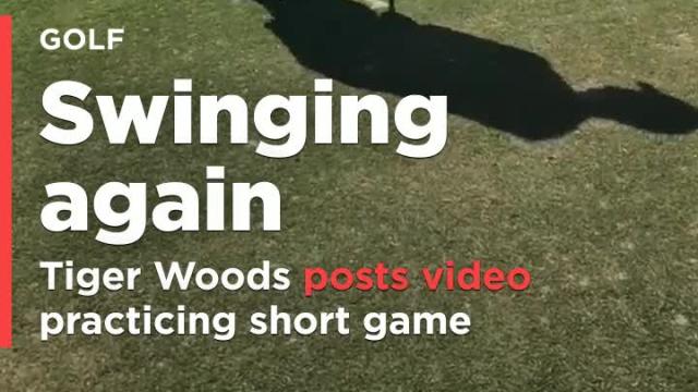 Woods posts video practicing short game