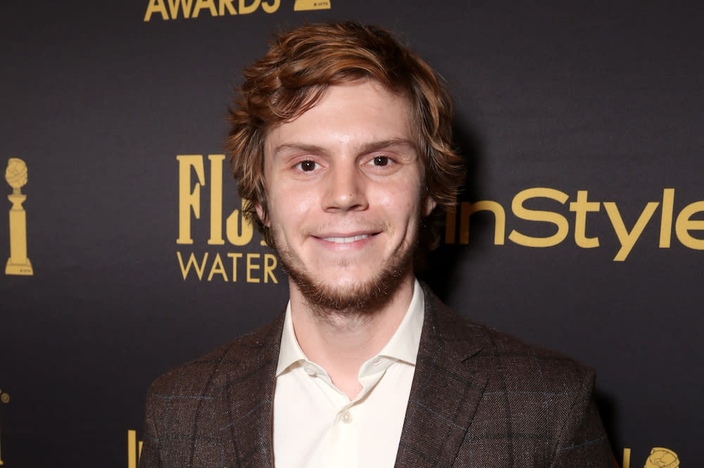 Evan Peters wants us all to buy his official "Ugly Christmas Sweater&q...