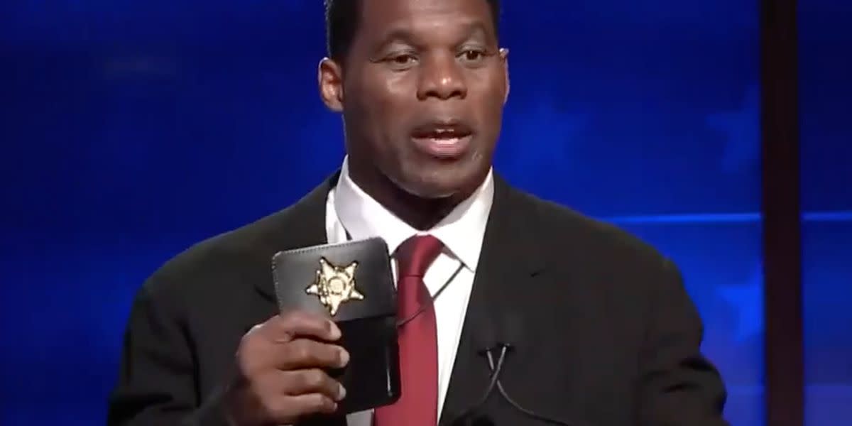 Herschel Walker Flashes Fake Police Badge In Georgia Debate Against Raphael Warn..