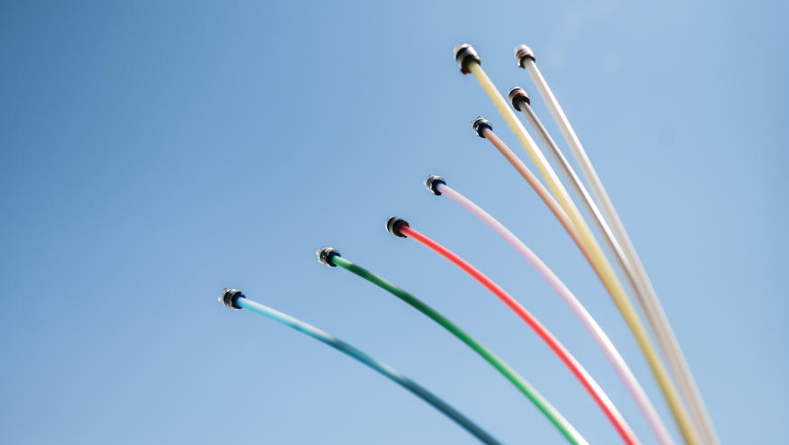 15 July 2024, Baden-Württemberg, Rottweil: Fiber optic cables with various connections protrude from the ground at a construction site near a residential area in Rottweil. Photo: Silas Stein/dpa (Photo by Silas Stein/picture alliance via Getty Images)