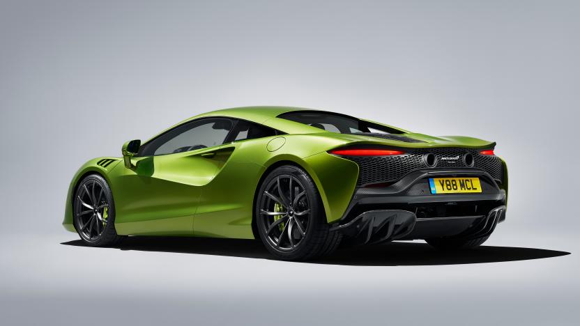 McLaren Automotive's High-Performance Hybrid super car in green shown against grey background.