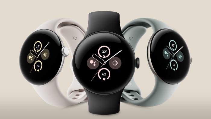 Hero image of the Google Pixel Watch 2 with three units in a row on a cream background.