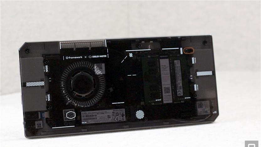 Image of the Framework x Cooler Master chassis case for Framework's mainboards when not inside one of the company's laptop chassis.