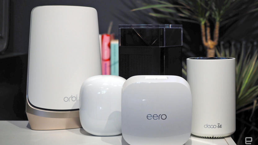 Family image of several WiFi routers including a Netgear Orbi, Nest WiFi Pro, Eero Pro, ZenWifi Pro and Deco XE75.