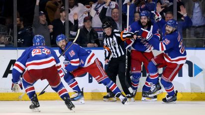 Getty Images - NEW YORK, NEW YORK - MAY 07: Vincent Trocheck #16 of the New York Rangers celebrates with teammates after scoring the winning goal in the second overtime against the Carolina Hurricanes in Game Two of the Second Round of the 2024 Stanley Cup Playoffs at Madison Square Garden on May 07, 2024 in New York City. (Photo by Bruce Bennett/Getty Images)