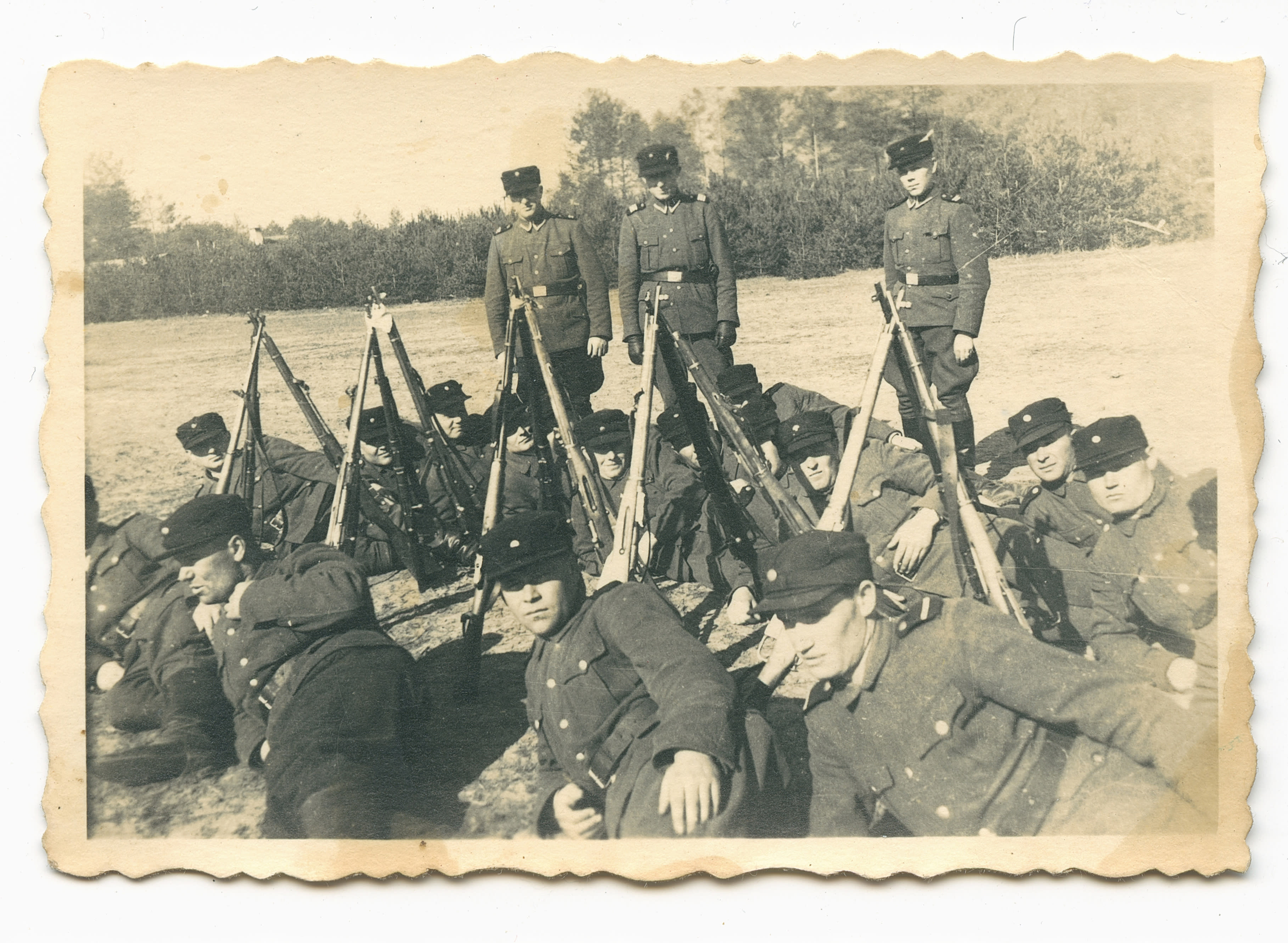 This spring 1943 photo provided by the U.S. Holocaust Memorial Museum shows a group of auxiliary guards at the Nazi death camp Sobibor in German-occupied Poland. A Holocaust historian said researchers concluded that John Demjanjuk, the retired Ohio auto worker who was tried in Germany for his alleged time as a Sobibor guard, is presumably depicted in this photo. (U.S. Holocaust Memorial Museum via AP)