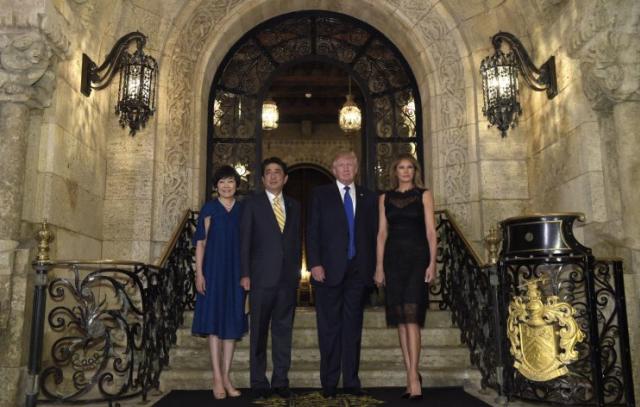 President Donald Trump, and Melania Trump, right, stop to pose for a photo with Japanese Prime Minister Shinzo Abe, second from left, and his wife Akie Abe, left, before they have dinner at Mar-a-Lago in Palm Beach, Fla., Saturday, Feb. 11, 2017. (Photo: AP /Susan Walsh)