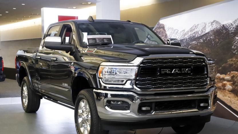 FILE - In this Feb. 14, 2019, photo a Ram 2500 Limited truck on display at the 2019 Pittsburgh International Auto Show in Pittsburgh. Fiat Chrysler’s Ram pickup unseated General Motors’ Chevrolet Silverado as the second-best selling vehicle in the U.S. during the first nine months of the year. (AP Photo/Gene J. Puskar, File)