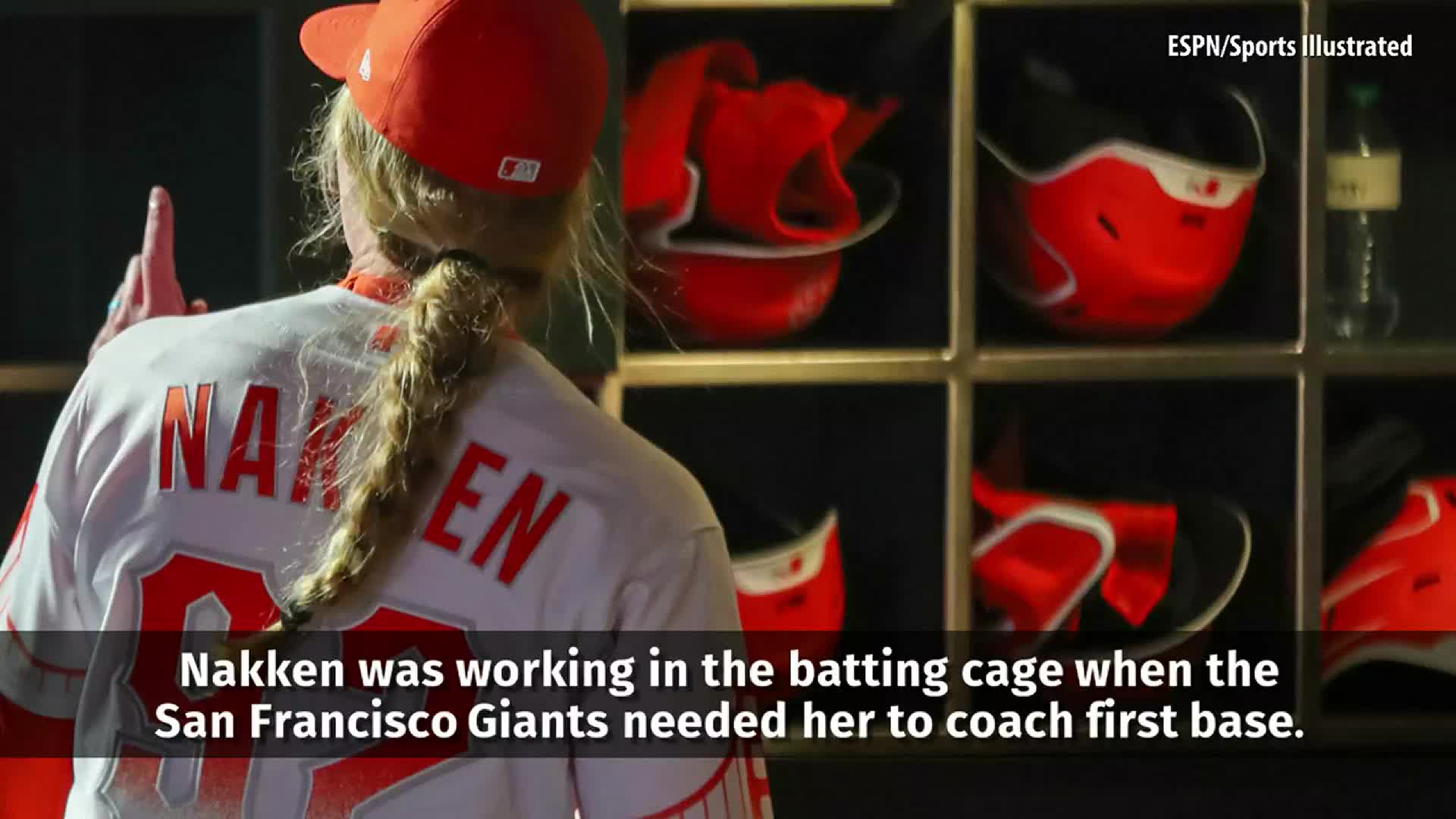 Giants first base coach Alyssa Nakken, right, chats with Mike News Photo  - Getty Images