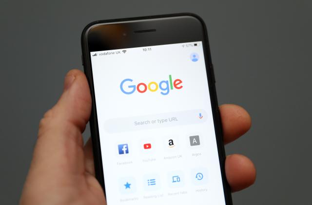 A person holds an iphone showing the app for Google chrome search engine. PA Photo. Picture date: Friday January 3, 2020. Photo credit should read: Andrew Matthews/PA Wire (Photo by Andrew Matthews/PA Images via Getty Images)