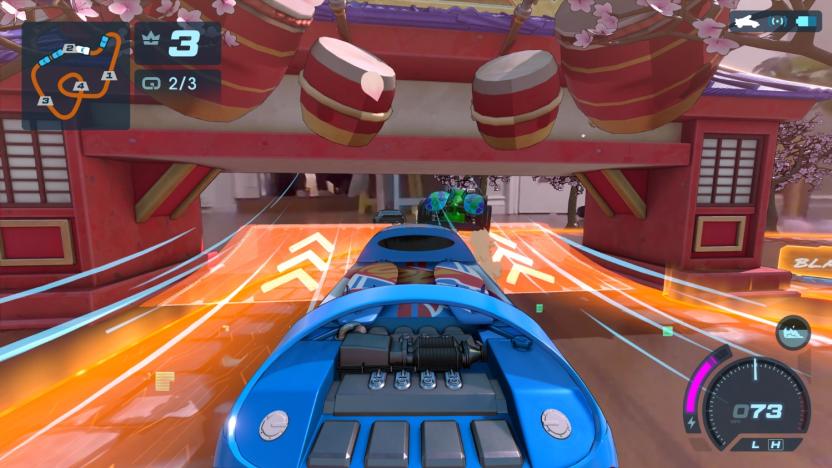 Gameplay screenshot showing a blue car driving along an orange track with bongo drums up above.