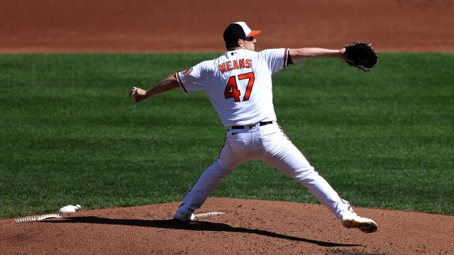 Download Kevin Gausman Wearing A White And Blue Jersey Wallpaper