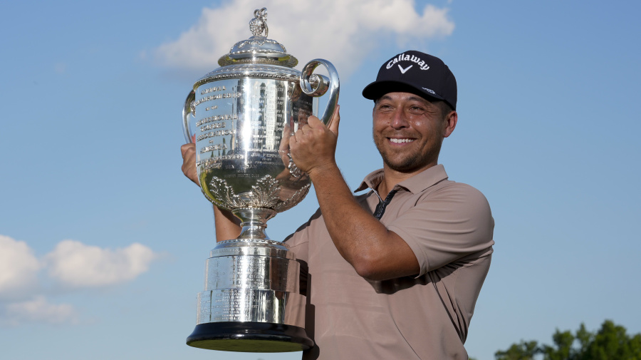 Associated Press - Xander Schauffele holds the Wanamaker trophy after winning the PGA Championship golf tournament at the Valhalla Golf Club, Sunday, May 19, 2024, in Louisville, Ky. (AP Photo/Sue Ogrocki)