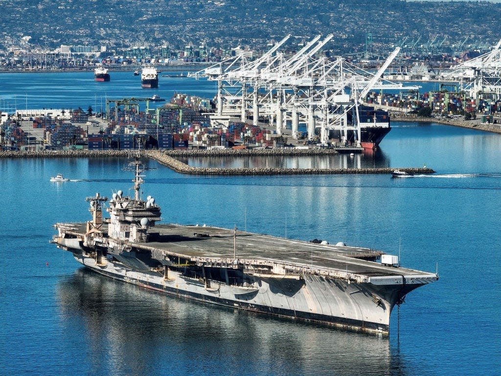 US Navy aircraft carrier to be broken down for just a cent arrives at scrapyard ..