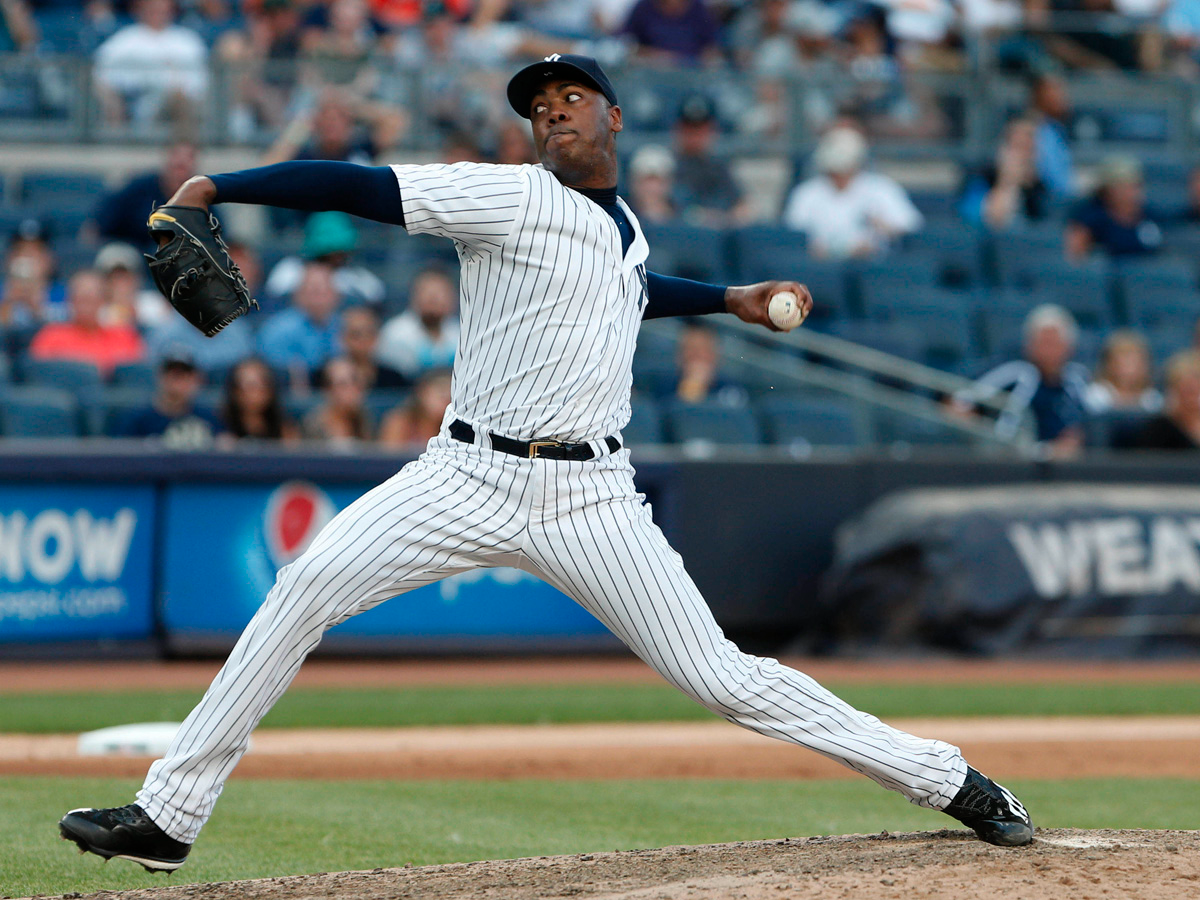 Yankees closer Aroldis Chapman throws a strike - Gold Medal