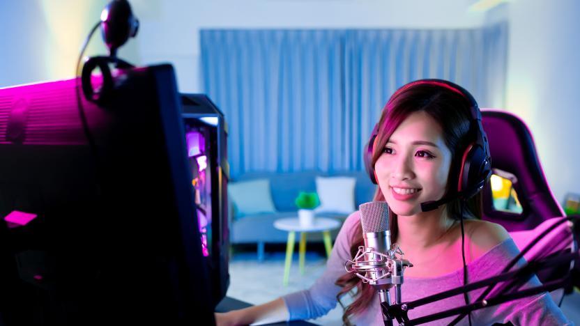 Young Asian Pretty Pro Gamer have live stream and chat with fans happily at home