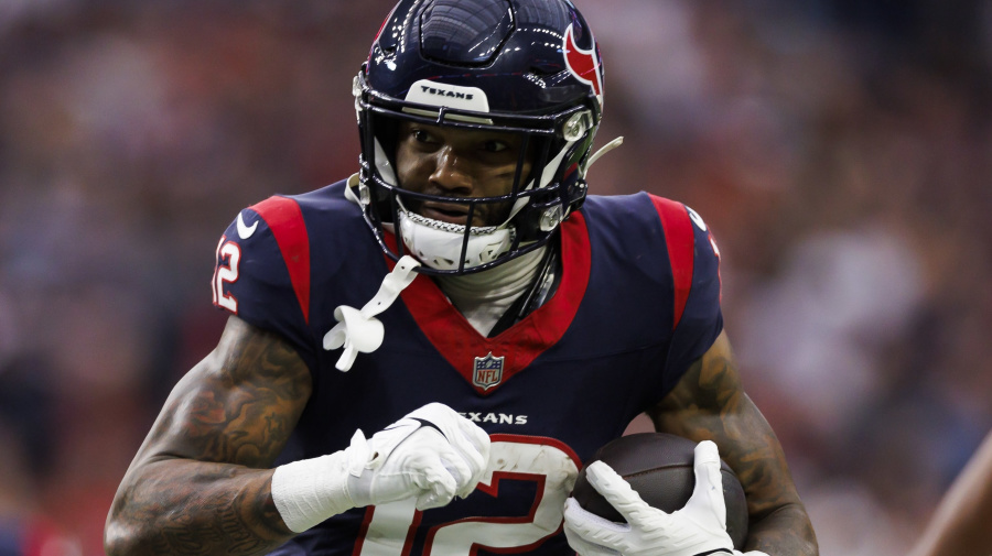 Getty Images - HOUSTON, TEXAS - JANUARY 13: Nico Collins #12 of the Houston Texans runs the ball to score a touchdown during an AFC wild-card playoff football game against the Cleveland Browns at NRG Stadium on January 13, 2024 in Houston, Texas. (Photo by Ryan Kang/Getty Images)