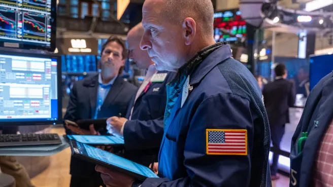 Dow closes above 40,000 for the first time ever