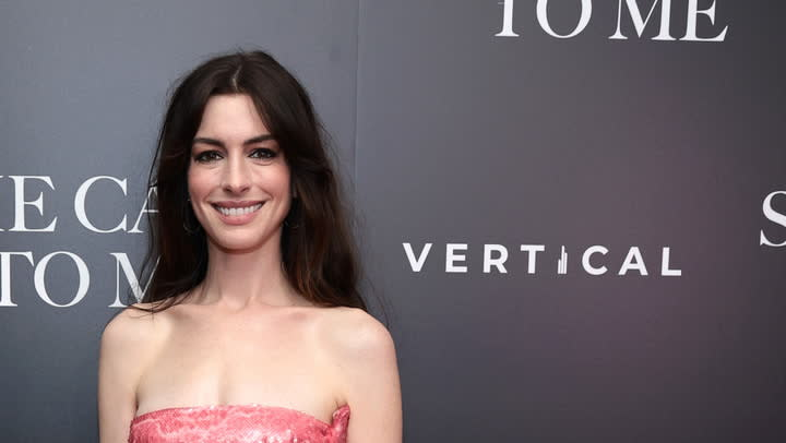 Anne Hathaway Puts a Bustier Twist on the Businesswoman Pantsuit