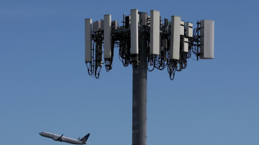 SAN FRANCISCO, CALIFORNIA  - JANUARY 18: A United Airlines plane flies by a cellular tower as it takes off from San Francisco International Airport  on January 18, 2022 in San Francisco, California. Verizon and AT&T announced that they will proceed with plans to activate 5G cellular service across the nation on Wednesday with the exception of near airports and runways after the Federal Aviation Administration and major airlines warned that the signal could interfere with navigational systems on some planes and cause flight disruptions. (Photo by Justin Sullivan/Getty Images)