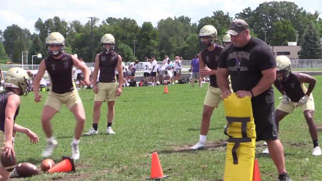 Opening day football training camp tour of Fowlerville, Howell, Pinckney