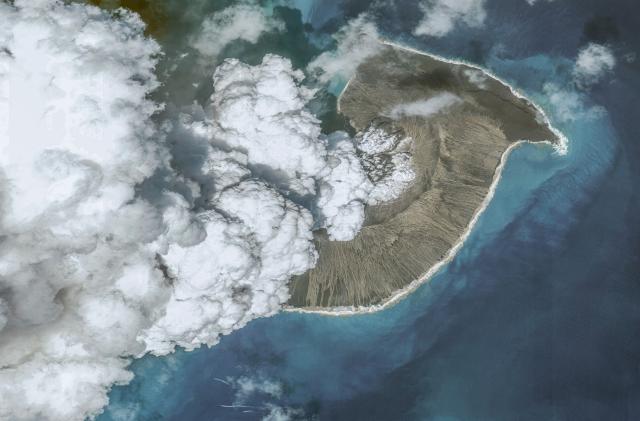 HUNGA TONGA-HUNGA HA'APAI, TONGA – DECEMBER 24, 2021: In this image 2. of a series created on January 19, 2022, Maxar overview satellite imagery shows the Hunga Tonga-Hunga Ha'apai volcano on December 24, 2021, before the eruption on January 14th , 2022 in Hunga Tonga-Hunga Ha'apai Islands, Tonga. (Photo by Maxar via Getty Images)