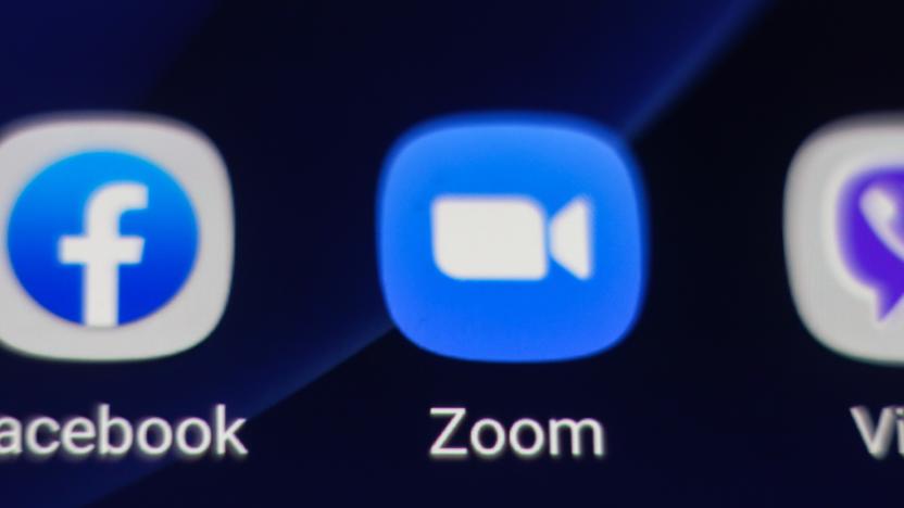 ZOOM Video Communications logo displayed on a phone screen, thumbnails of the application, smartphone and keyboard are seen in this multiple exposure illustration. Zoom is an American communications technology company headquartered in San Jose, California. It provides videotelephony and online chat services through a cloud-based peer-to-peer software platform and is used for teleconferencing, telecommuting, distance education, and social relations. Zoom App and communication became very popular during the Covid-19, Coronavirus pandemic quarantine lockdown and social distancing as people started massively distant video telecommunication. Thessaloniki, Greece April 24, 2020 (Photo by Nicolas Economou/NurPhoto via Getty Images)