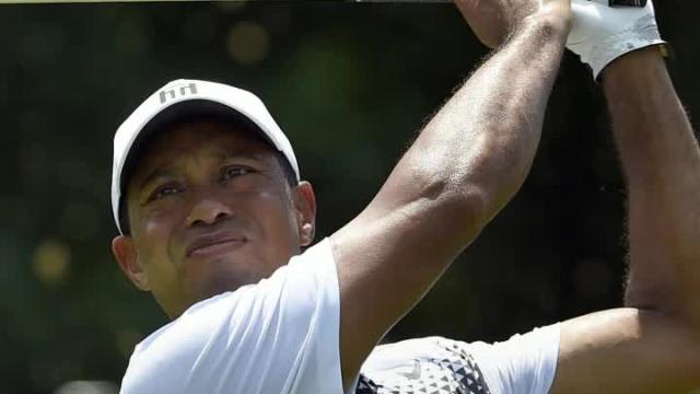 Tiger Woods goes on early run, falters late Saturday at Quicken Loans National
