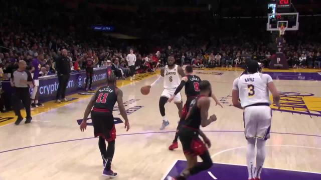 LeBron James with an and one vs the Chicago Bulls