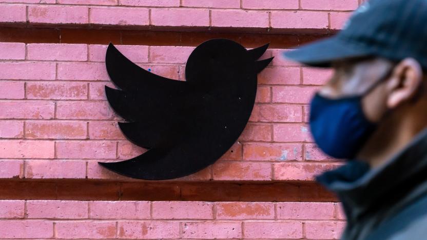 NEW YORK, UNITED STATES - 2020/10/14: A man wearing a face mask walks past a Twitter logo outside their New York City headquarters.
Facebook and Twitter took steps to limit the spread of a controversial New York Post article critical of Joe Biden, sparking outrage among conservatives and stoking debate over how social media platforms should tackle misinformation ahead of the US election. (Photo by John Nacion/SOPA Images/LightRocket via Getty Images)