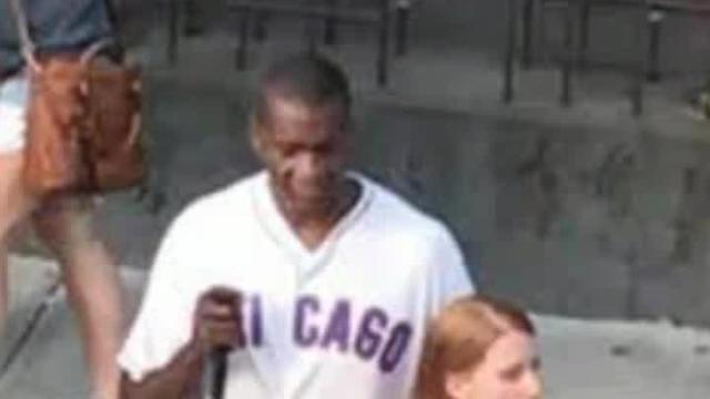 Woman helping blind Cubs fan hail cab will warm your heart