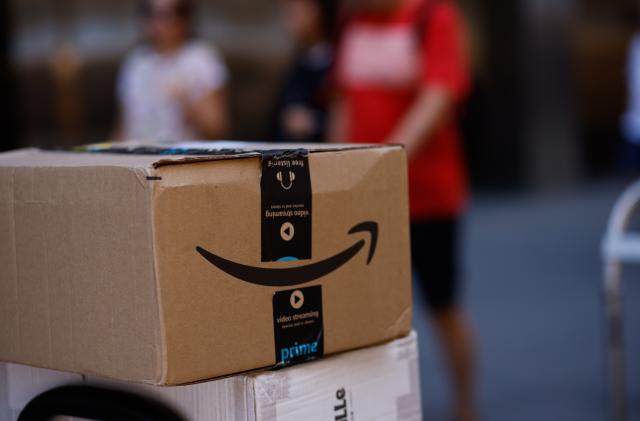 NEW YORK, NEW YORK - JULY 21: Amazon workers unloading boxes from a truck in Manhattan on July 21, 2023 in New York City. The company will find recyclable alternatives to reemplazed the use of plastic padded bags for parcel shipments in order to impact on the environment, particularly the oceans. (Photo by Kena Betancur/VIEWpress)