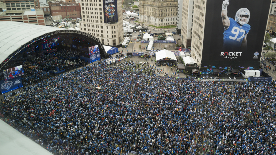 Getty Images - DETROIT, MICHIGAN - APRIL 26: An elevated overall general view of fans filling the area outside of the draft stage during the second round of the NFL football draft at Campus Martius Park on April 26, 2024 in Detroit, Michigan. (Photo by Ryan Kang/Getty Images)