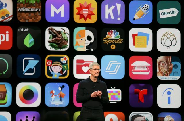 Apple Chief Executive Officer Tim Cook speaks at the Apple Worldwide Developer conference (WWDC) in San Jose, California, U.S., June 4, 2018.   REUTERS/Elijah Nouvelage