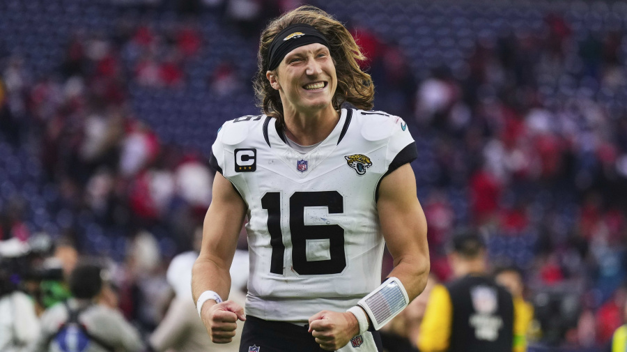 Getty Images - HOUSTON, TX - NOVEMBER 26: Trevor Lawrence #16 of the Jacksonville Jaguars celebrates after defeating the Houston Texans at NRG Stadium on November 26, 2023 in Houston, Texas. (Photo by Cooper Neill/Getty Images)