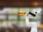 These fast-food workers are earning $25 an hour with paid vacation—as long as they work alongside a giant burger-slinging robot arm