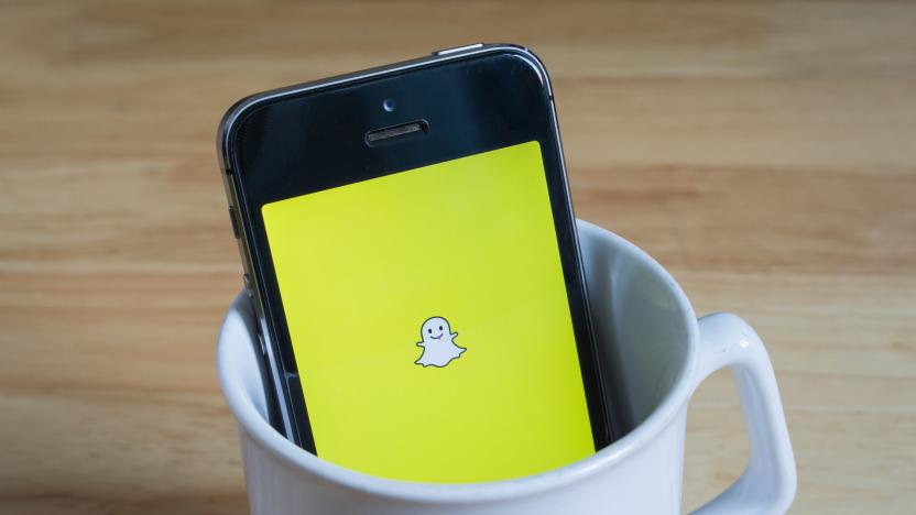 Bangkok, Thailand - April 22, 2017 : Apple iPhone5s in a mug showing its screen with Snapchat logo.