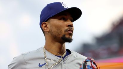 Getty Images - CINCINNATI, OHIO - MAY 24:  Mookie Betts #50 of the Los Angeles Dodgers jogs back to the dugout during the game against the Cincinnati Reds at Great American Ball Park on May 24, 2024 in Cincinnati, Ohio. Cincinnati defeated Los Angeles 9-6. (Photo by Kirk Irwin/Getty Images)