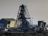 Elevator plummets at a platinum mine in South Africa, killing 11 workers and injuring 75