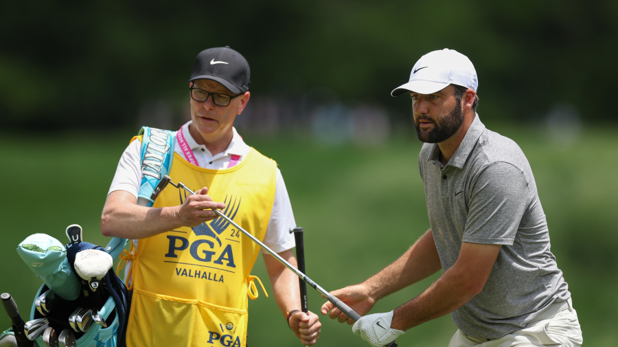 Getty Images - LOUISVILLE, KENTUCKY - MAY 18: Scottie Scheffler of the United States and caddie Brad Payne prepare to putt on the second green during the third round of the 2024 PGA Championship at Valhalla Golf Club on May 18, 2024 in Louisville, Kentucky. (Photo by Christian Petersen/Getty Images)