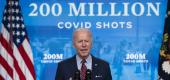 Vice President Kamala Harris and White House COVID-19 response coordinator Jeff Zients listen on Wednesday as President Biden speaks about COVID-19 vaccinations. (AP)