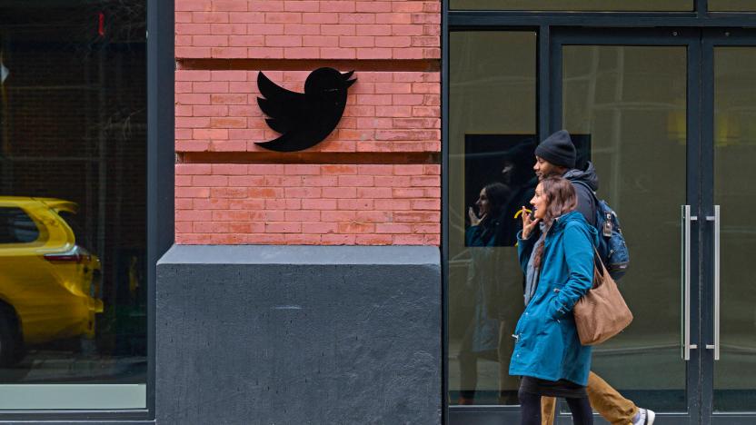 People walk past the Twitter offices in New York City on January 12, 2023. 