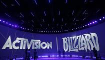 FILE - The Activision Blizzard Booth during the Electronic Entertainment Expo in Los Angeles, June 13, 2013. The Federal Trade Commission said Thursday, Dec. 8, 2022, that it is suing to block Microsoft’s planned $69 billion takeover of video game company Activision Blizzard, saying it could suppress competitors to its Xbox game consoles and its growing games subscription business. (AP Photo/Jae C. Hong, File)