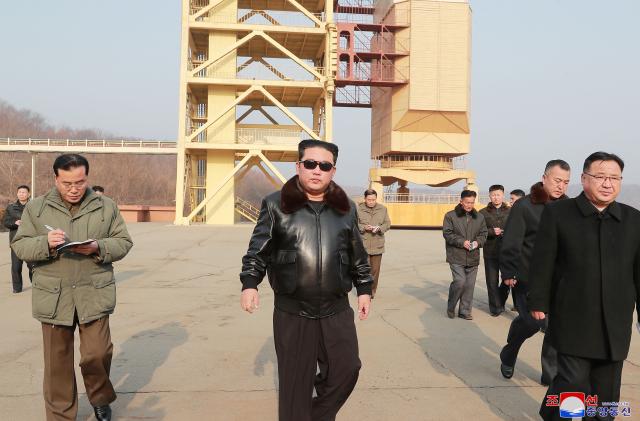 North Korean leader Kim Jong Un inspects Sohae Satellite launching ground, in North Korea, in this undated photo released on March 12, 2022 by North Korea's Korean Central News Agency (KCNA). KCNA via REUTERS ATTENTION EDITORS - THIS IMAGE WAS PROVIDED BY A THIRD PARTY. REUTERS IS UNABLE TO INDEPENDENTLY VERIFY THIS IMAGE. NO THIRD PARTY SALES. SOUTH KOREA OUT. NO COMMERCIAL OR EDITORIAL SALES IN SOUTH KOREA.