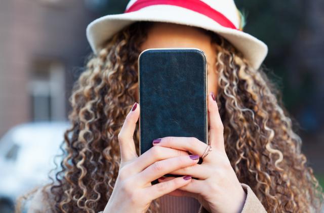 Young woman using smart phone