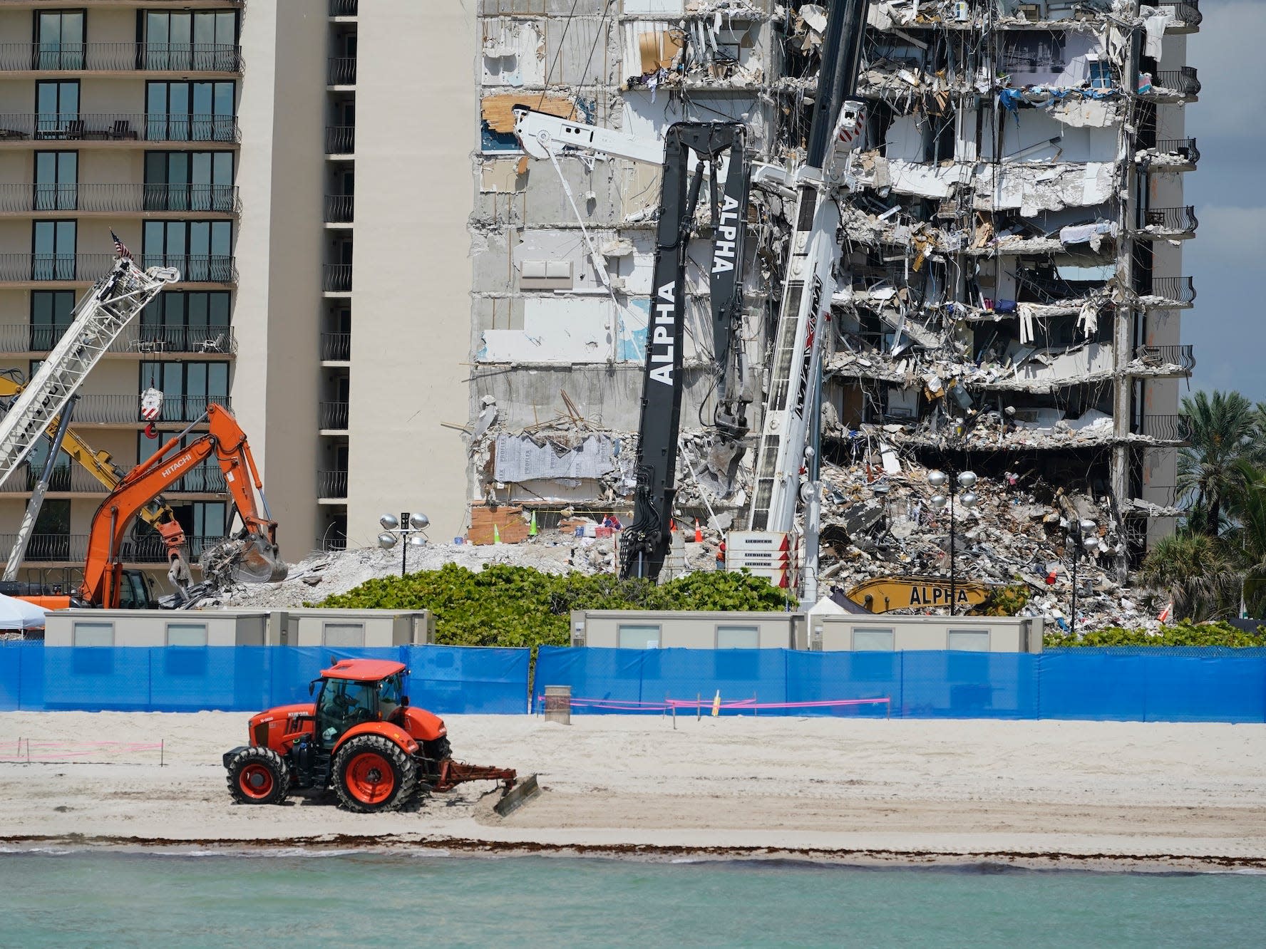 Rescuers searched 3 times for left-behind pets in the still-standing part of the collapsed Florida condo