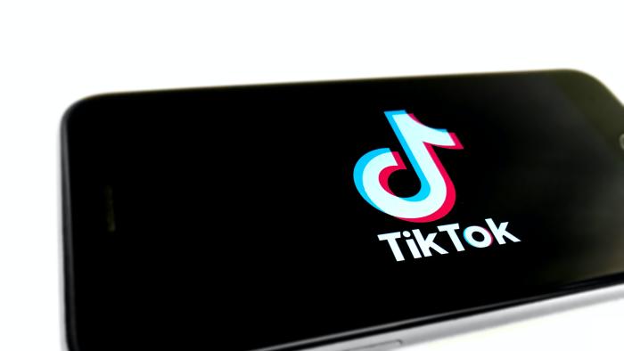 TikTok splash screen on iPhone.