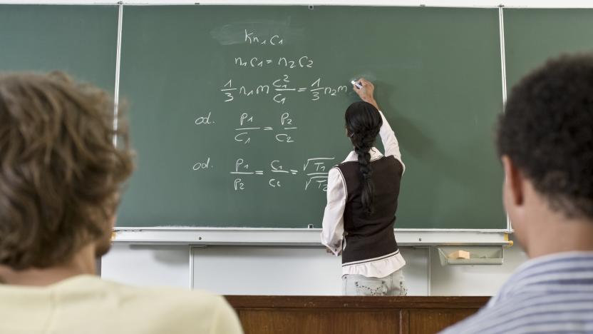 Student Using Blackboard in Classroom