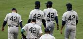 Seattle Mariners players wear No. 42 to honor Jackie Robinson. (AP)