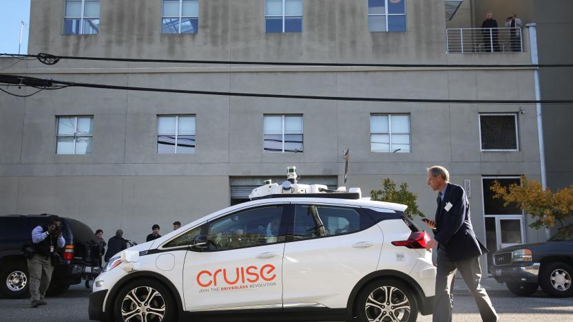 A journalist gets in a self-driving GM Bolt EV during a media event in San Francisco, California, U.S. November 28, 2017. REUTERS/Elijah Nouvelage